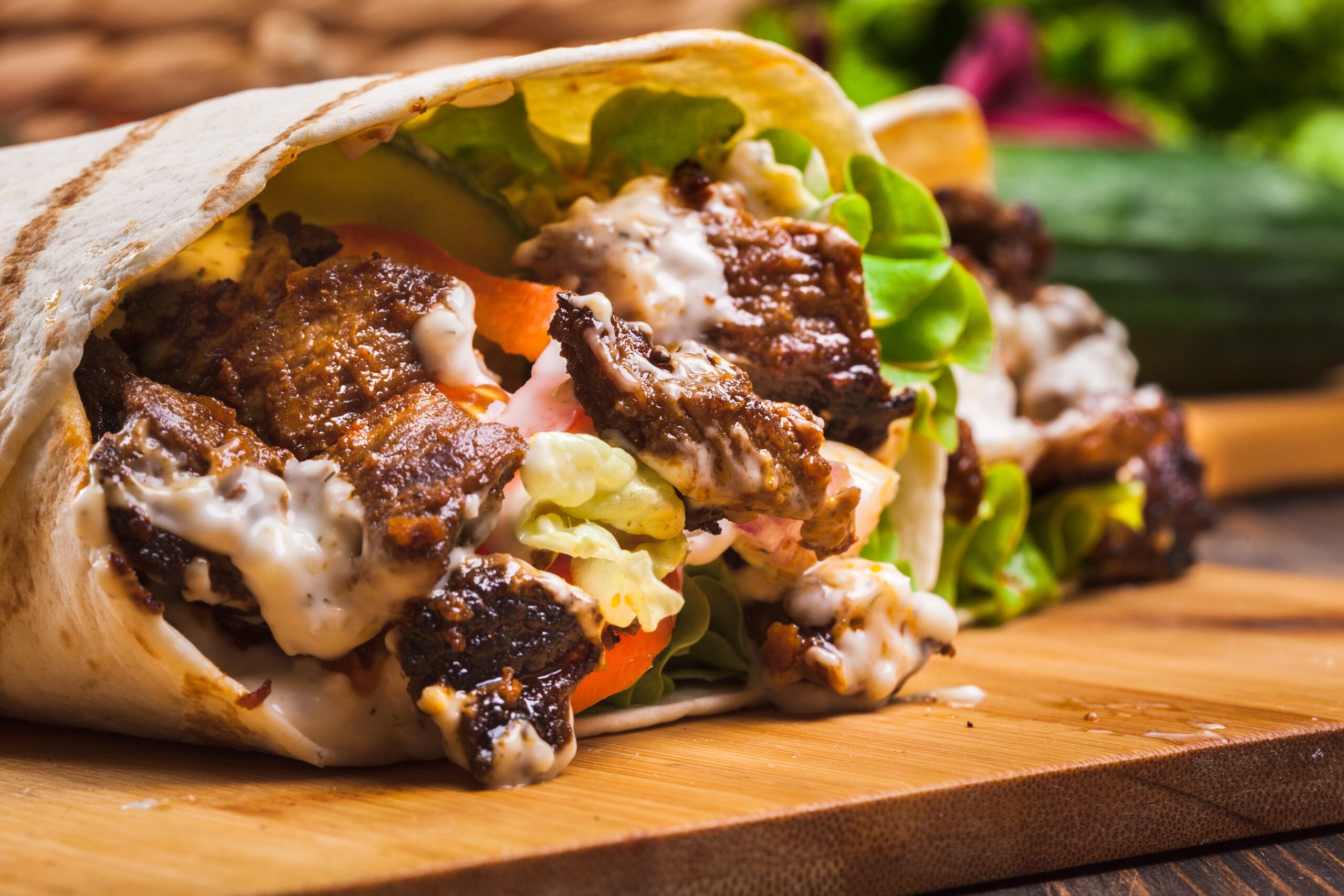 Tasty fresh wrap burrito with beef and vegetables