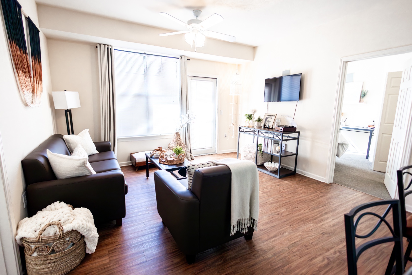 Fully furnished living room at Maverick Place