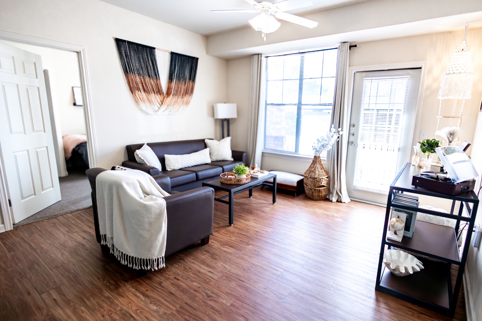 Living room and entrance of a model apartment at Maverick Place Living room and entrance of a model apartment at Maverick Place