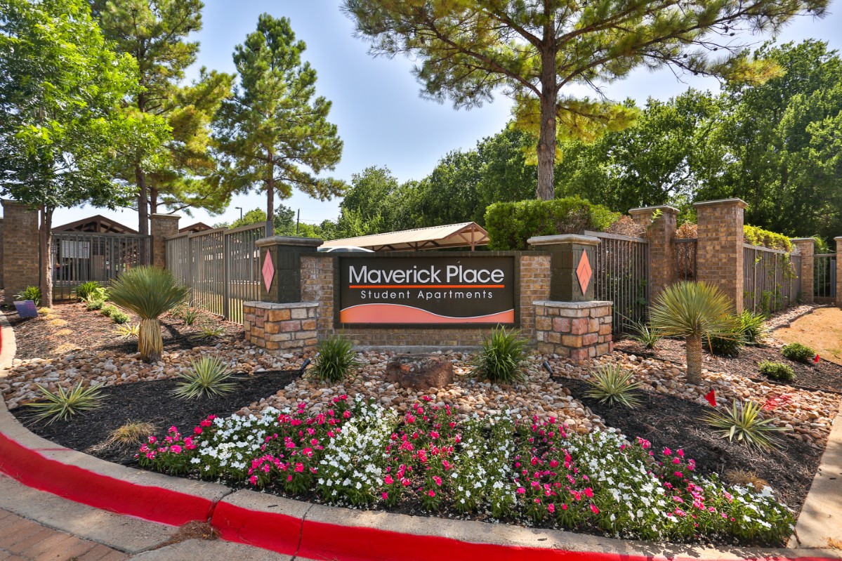 Entrance sign for Maverick Place Apartments